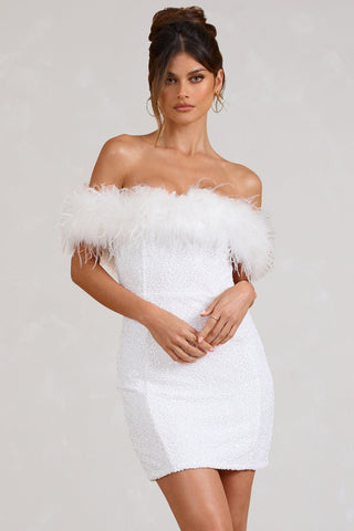 Robe à pailettes avec plumes