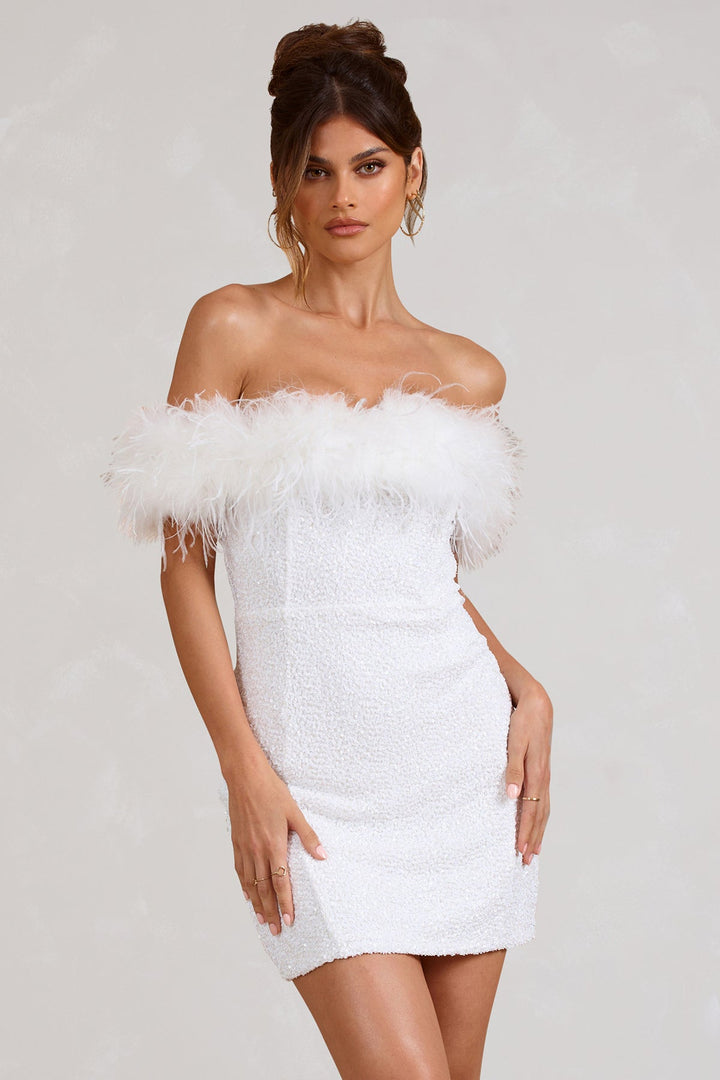 Robe à pailettes avec plumes