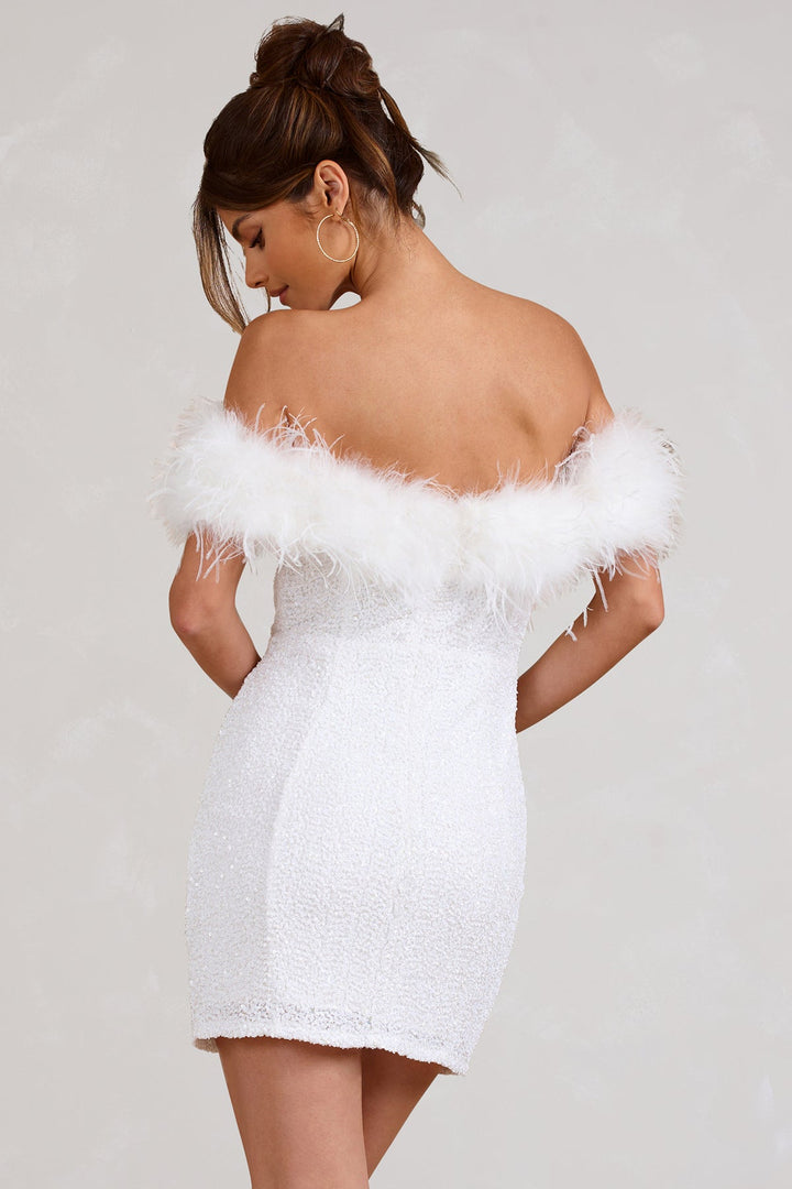 Robe à pailettes avec plumes