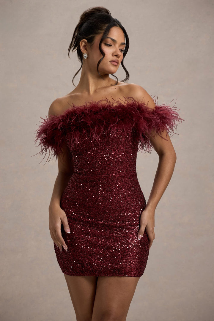Robe à pailettes avec plumes